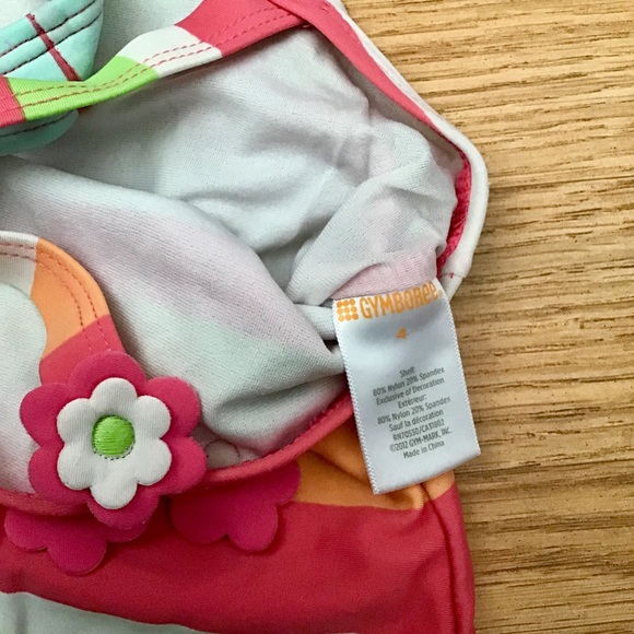 Gymboree color block swimsuit with flowers. - Picture 8 of 9